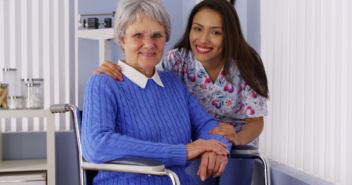 Nursing assistant with patient